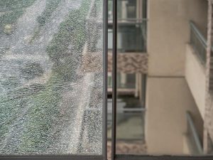 Spontaneous Breakage of Thermally Toughened Glass